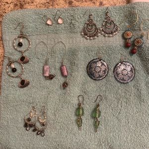 8 pairs of vintage baho style earrings.